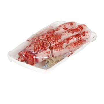 Blodig afhugget hånd i kødpakke